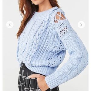 Light blue cable sweater